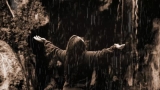 Woman Worshiping In The Rain