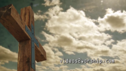 Read more about the article Large Wood Cross And Moving Clouds