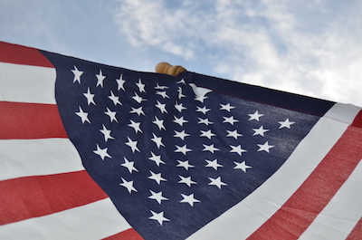 US Flag And Clouds