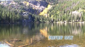 Read more about the article Calm Mountain Lake During Fall Season