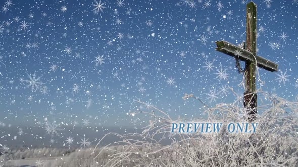 Read more about the article Frosted Cross And Falling Snow Background