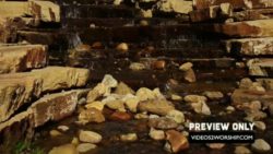 Read more about the article Water On Ancient Steps Motion Background