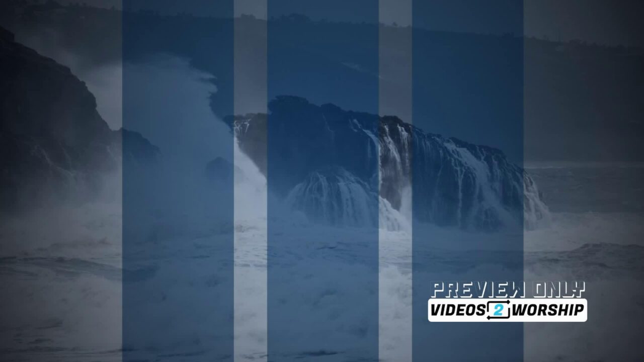 Ocean Waves Crashing Into Masive Rocks